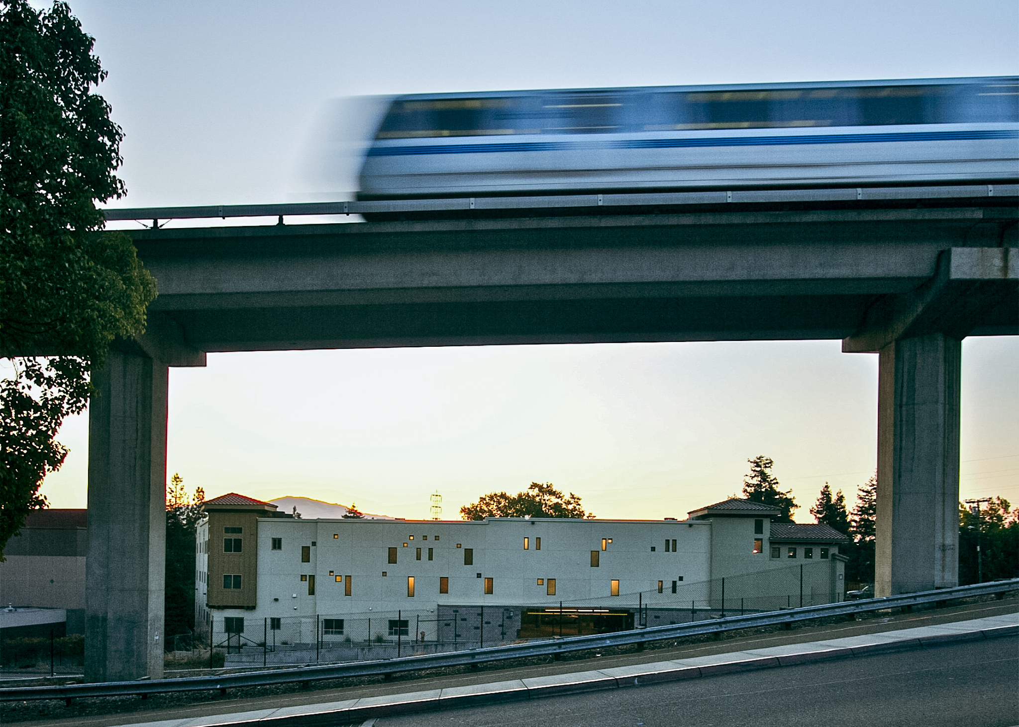 View of BART passing through the tracks next to the west side of Acalanes Court in Walnut Creek, CA.