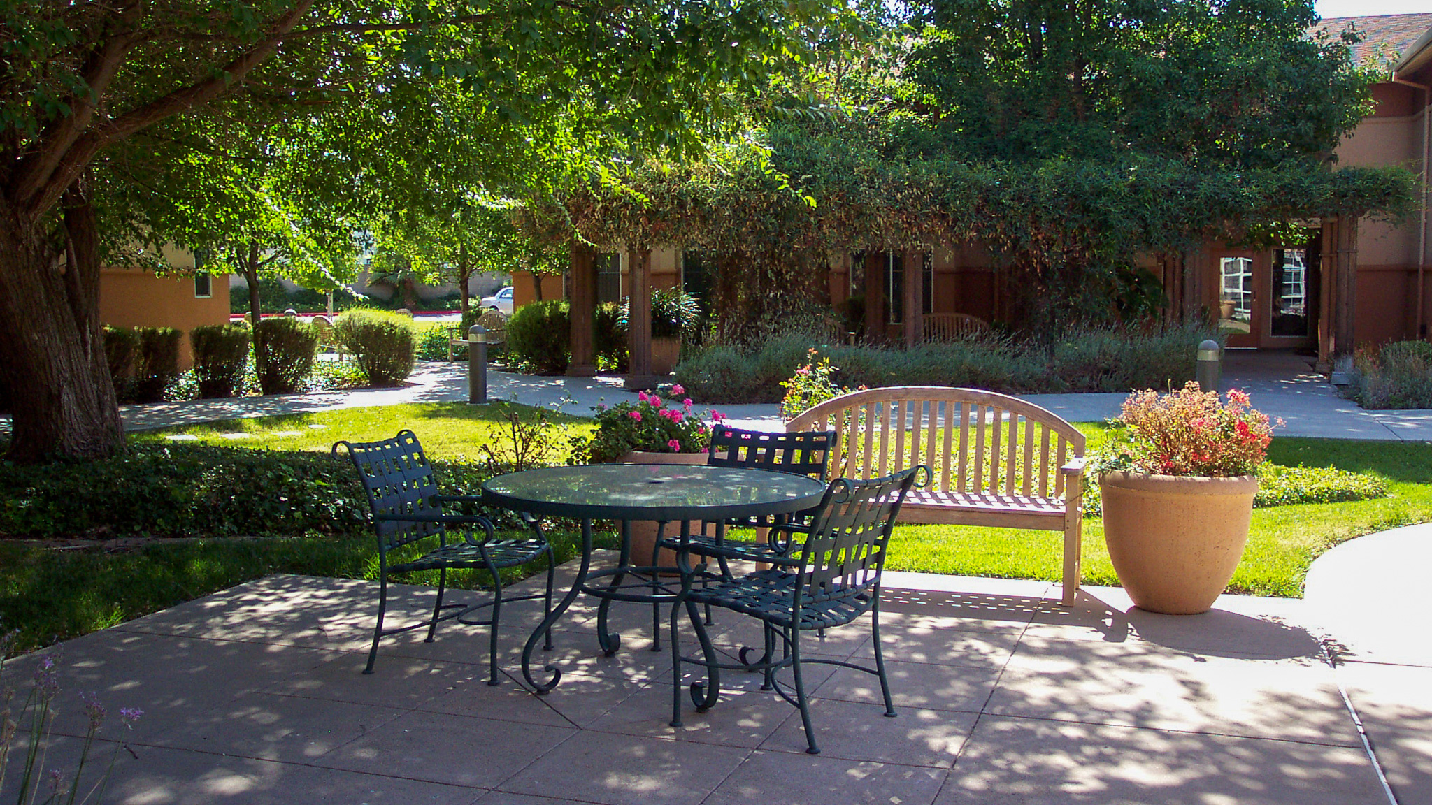 Patio tables in the courtyard at Columbia Park Manor in Pittsburg, CA