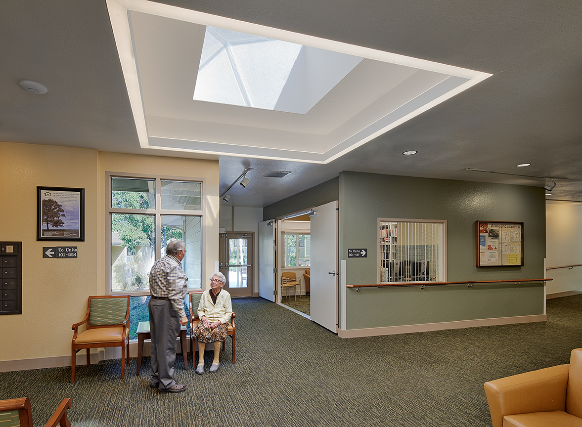 Residents in lobby of Casa Montego in Walnut Creek, CA.