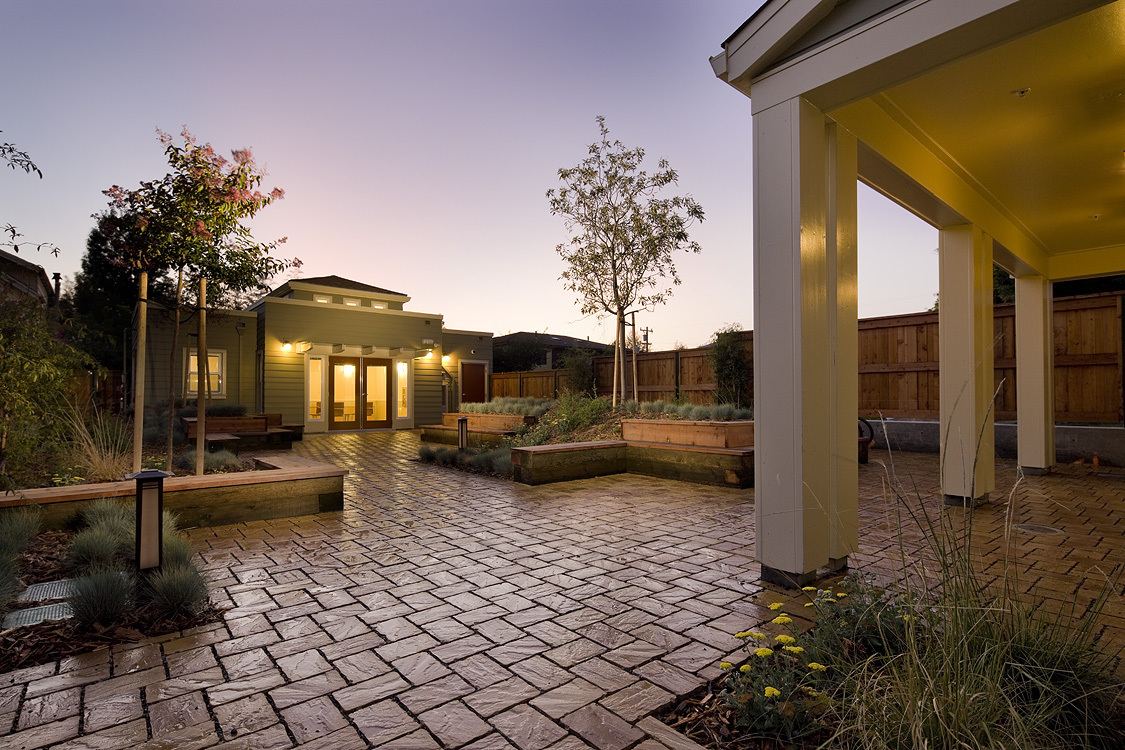 Community building at dusk at Harmon Gardens in Berkeley, CA.