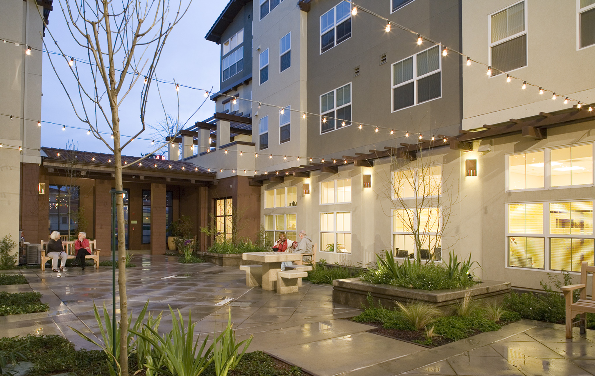 Helios Corner courtyard at dusk in Berkeley, CA