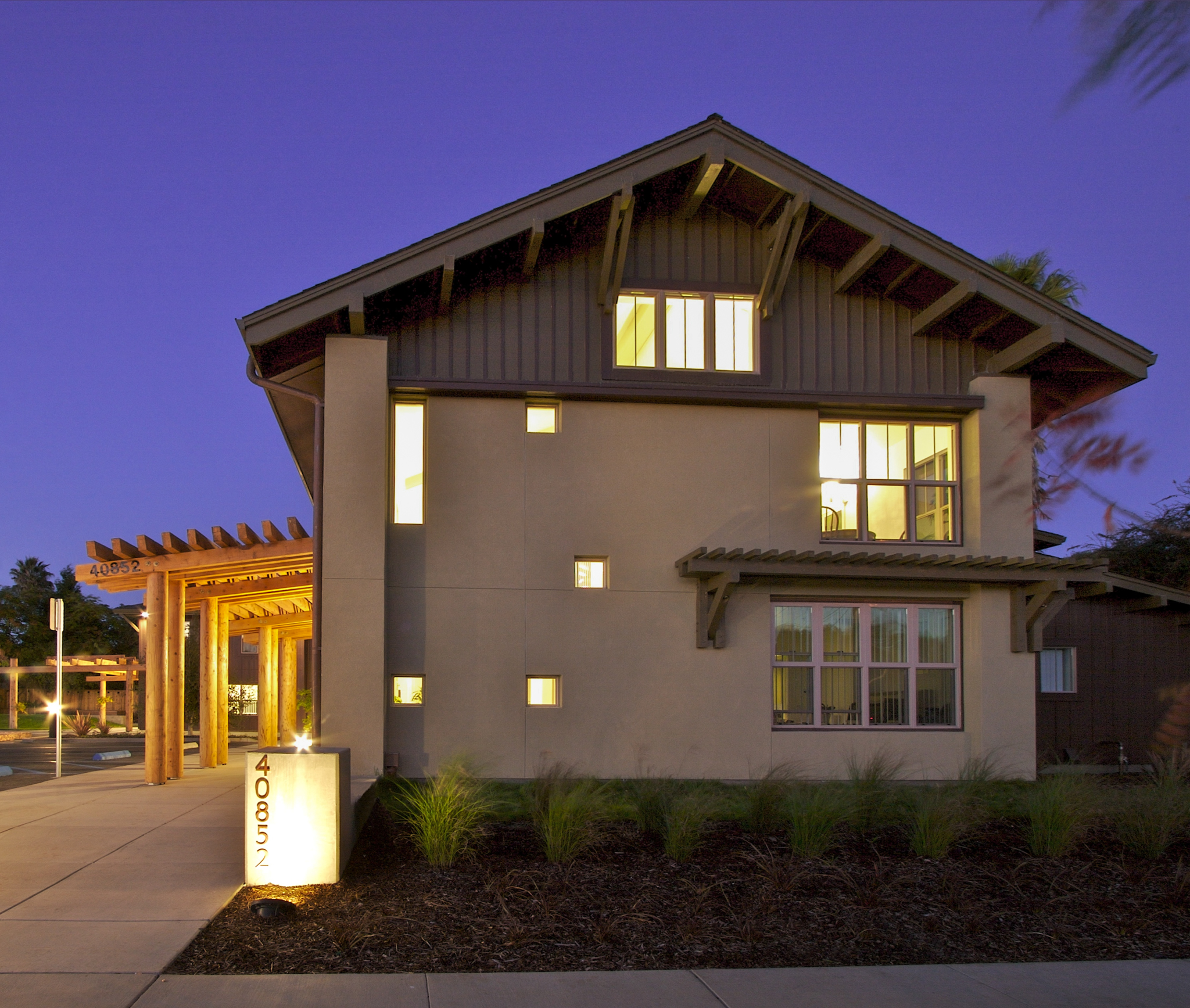 Front sunset view of Lincoln Oaks Apartments in Fremont, CA.