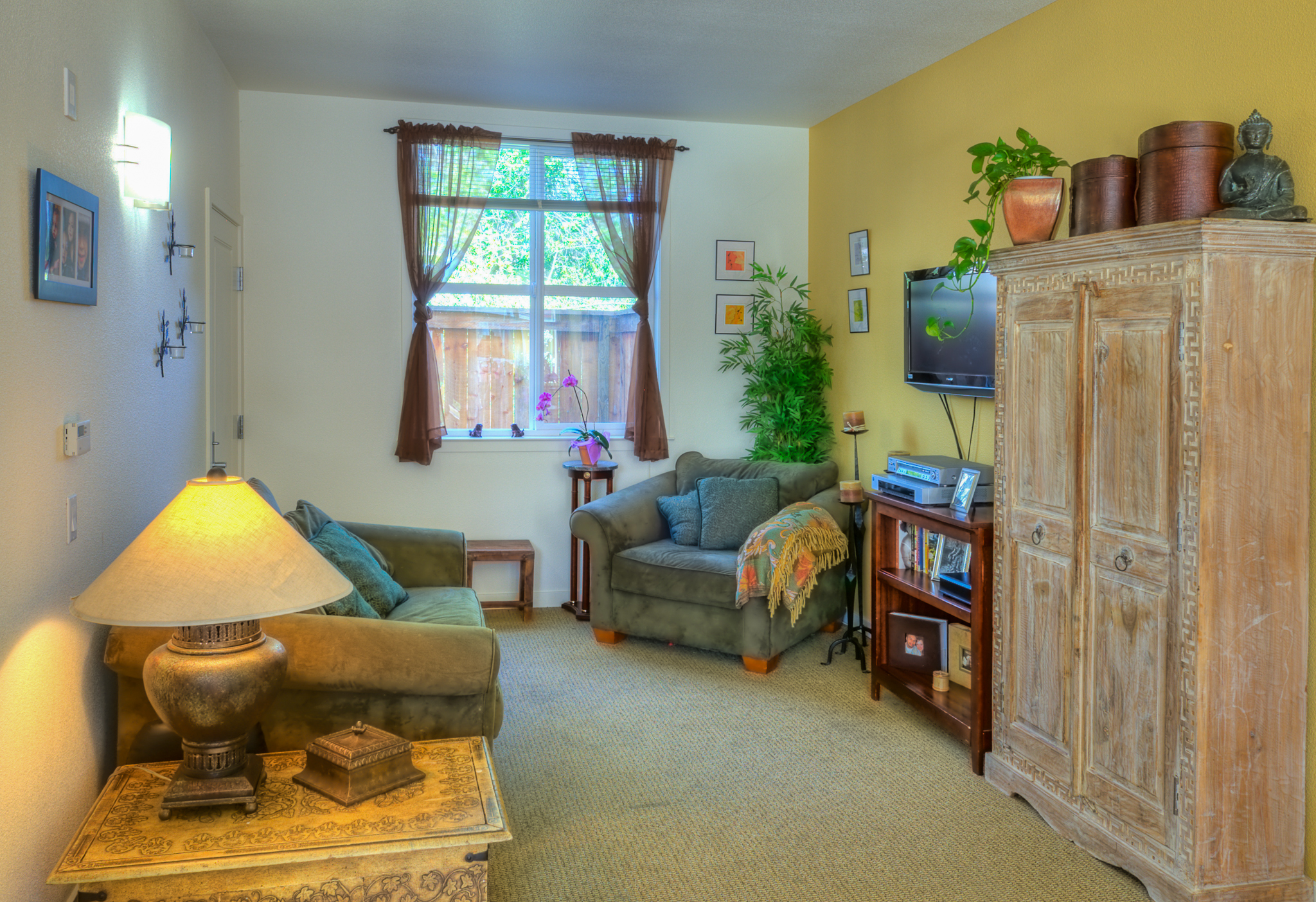 Living room in unit at Petaluma Avenue Homes in Petaluma, CA.