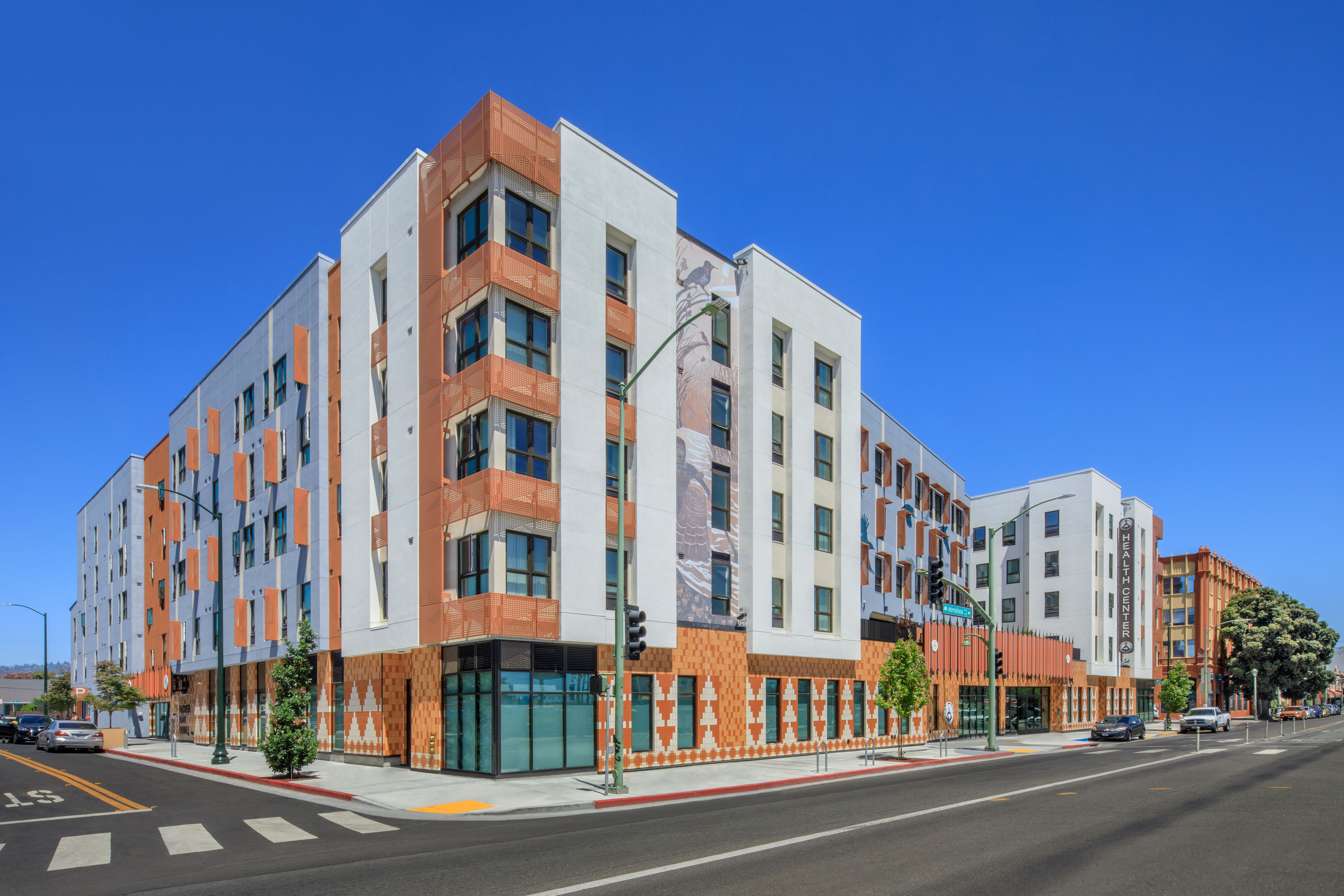 Corner view of Flicker Bird Homes and Native American Health Center in Oakland, CA