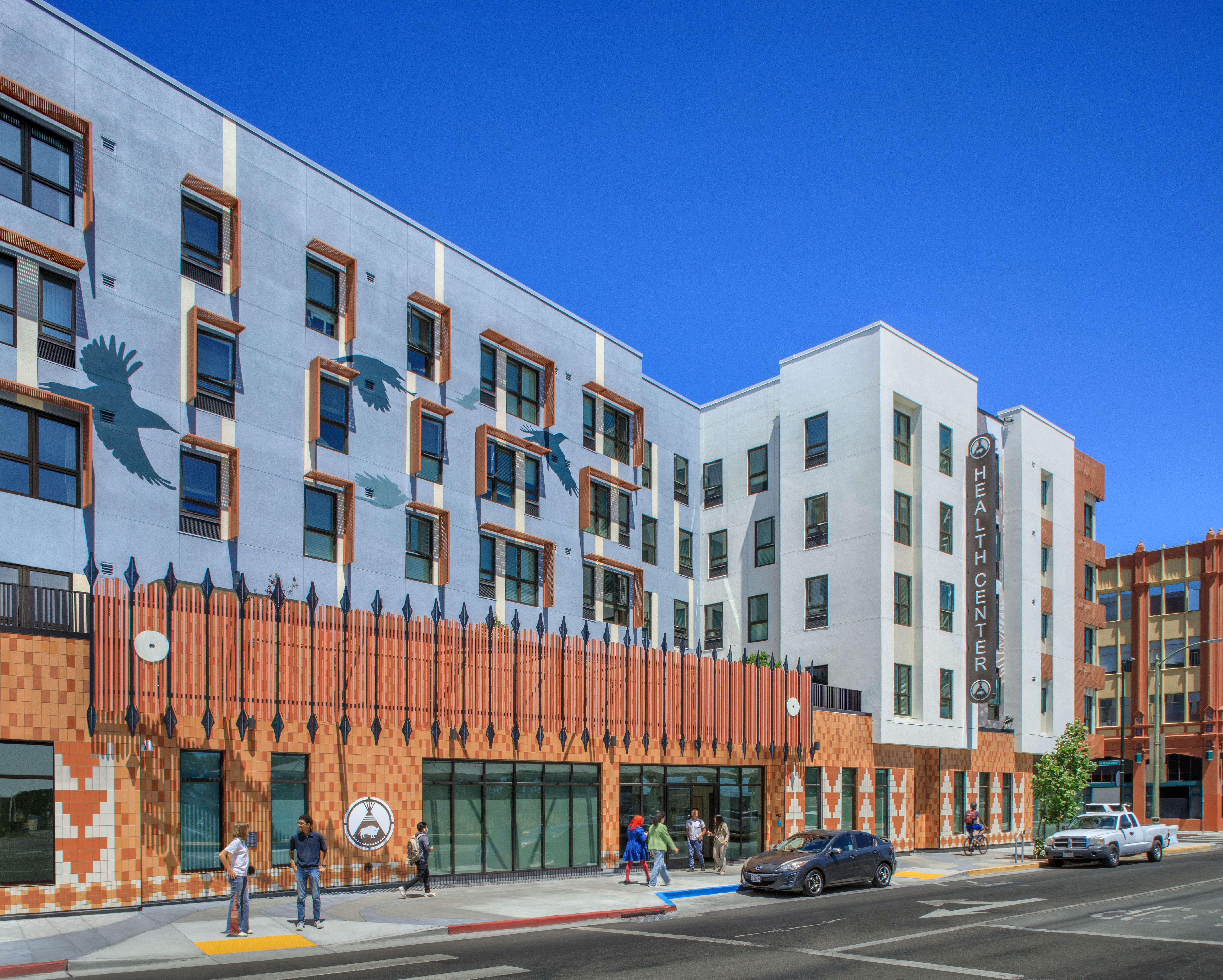 Street view of Flicker Bird Homes and Native American Health Center in Oakland, CA from Derby St
