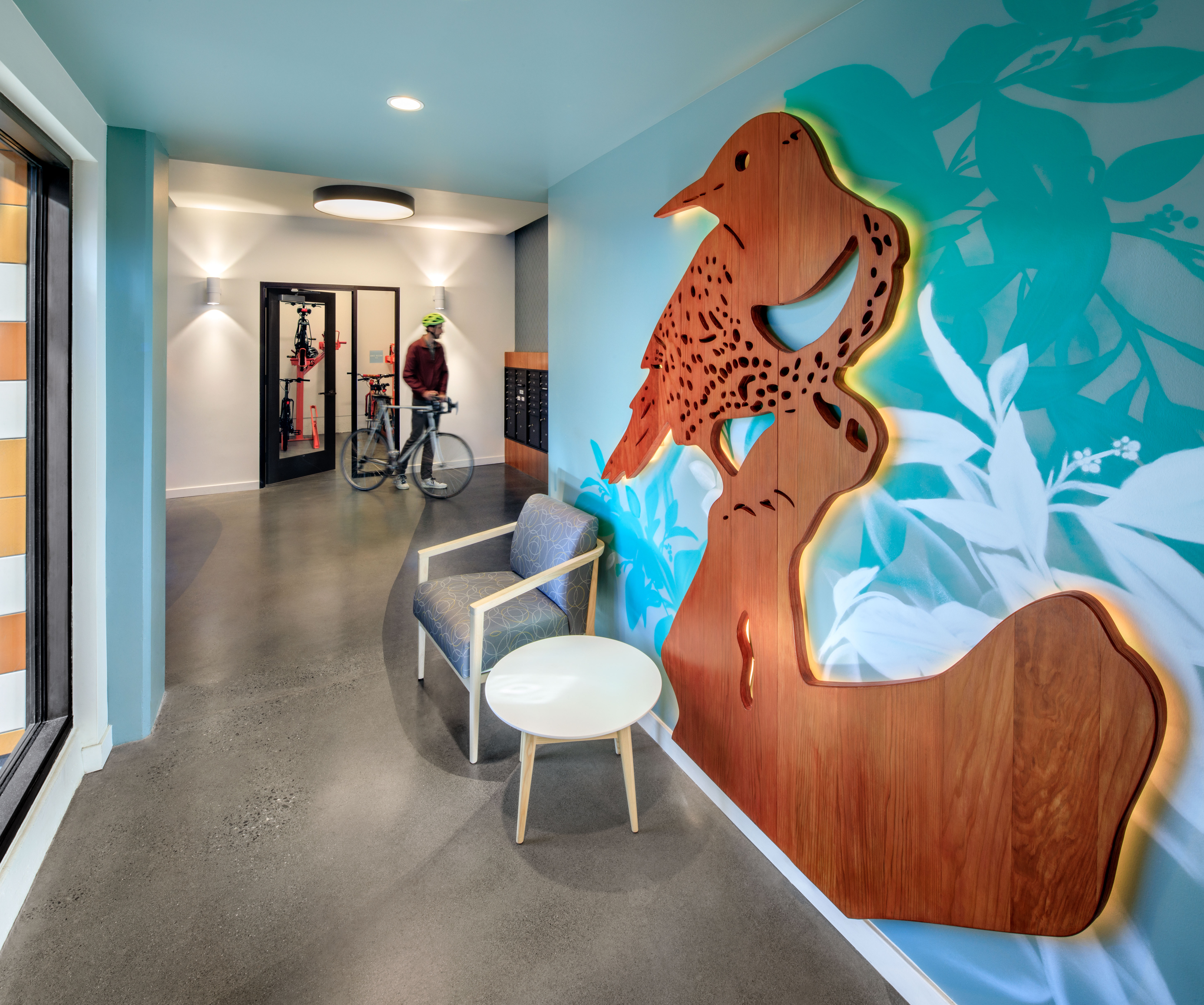 Wall art at the main entrance of Flicker Bird Homes and Native American Health Center in Oakland, CA