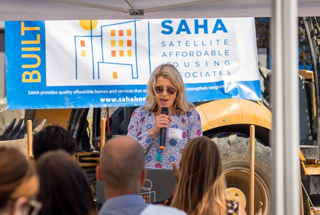 SAHA Vice President of Real Estate Development Eve Stewart speaks at the groundbreaking ceremony of 811 San Pablo.